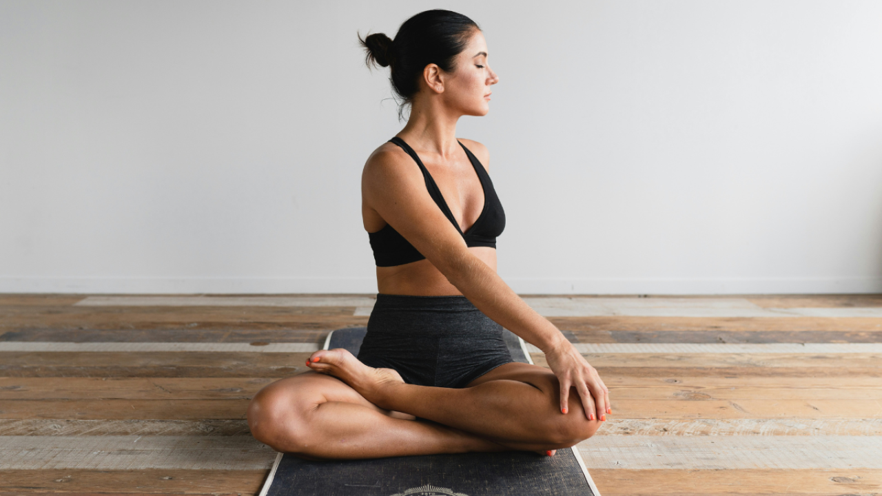Stress Less, Breathe More: The Mental Health Benefits of Regular Yoga Practice